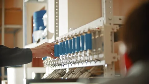 Technician servicing electrical relay panel in control room Stock Footage 347725417