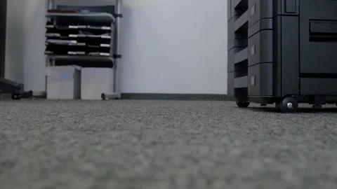 Technician sets up a multi-function copier device. Stock-Footage 170742476