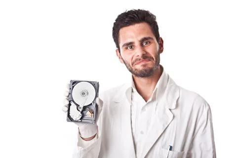 Technician showing hard disk Stock Photos