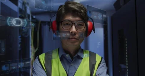 Technician standing in data center while system initiating diagnostic UI panels Stock Footage 331272706