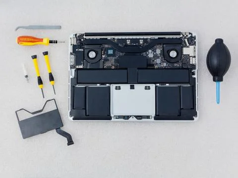 Technician support upgrade part and fixing laptop. Stock Photos