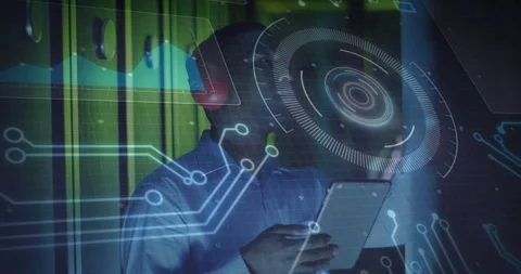 Technician swiping tablet activating circuit hologram spinning data ring for 動画素材 317260644