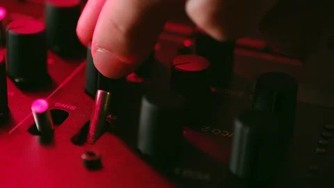 Technician switches knobs and levers on mixing console 스톡 동영상 296747542