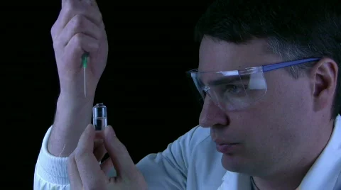 Technician Syringe Stock-Footage 681634
