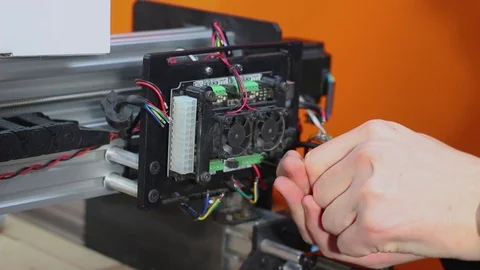 Technician Tampering With Electrical Components Of A Machine. Stock Footage 100756958