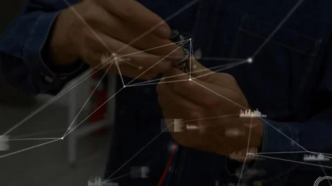 Technician in tech lab unscrewing black cap from sensor while inspecting and Stock Footage 310438166