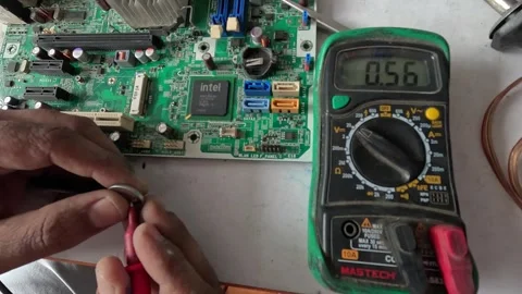 Technician is testing electrical equipment and computer parts Stock Footage 247818455