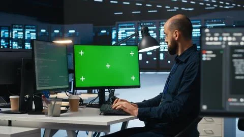 Technician upgrading servers nd storage arrays using chroma key PC 스톡 사진