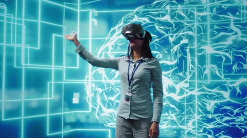 Technician uses virtual reality technology to build AI algorithms Video stock 278700078