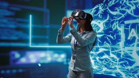 Technician uses virtual reality technology to build AI algorithms Stock Photos