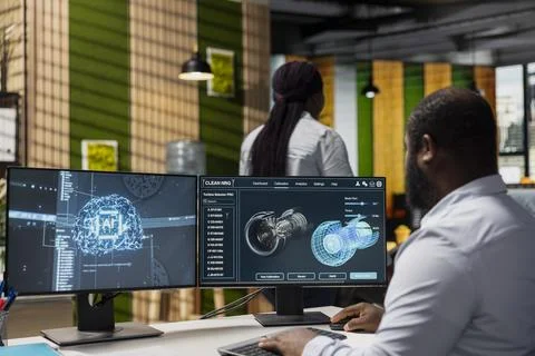 Technician using artificial intelligence to improve wind turbine component Stock Photos