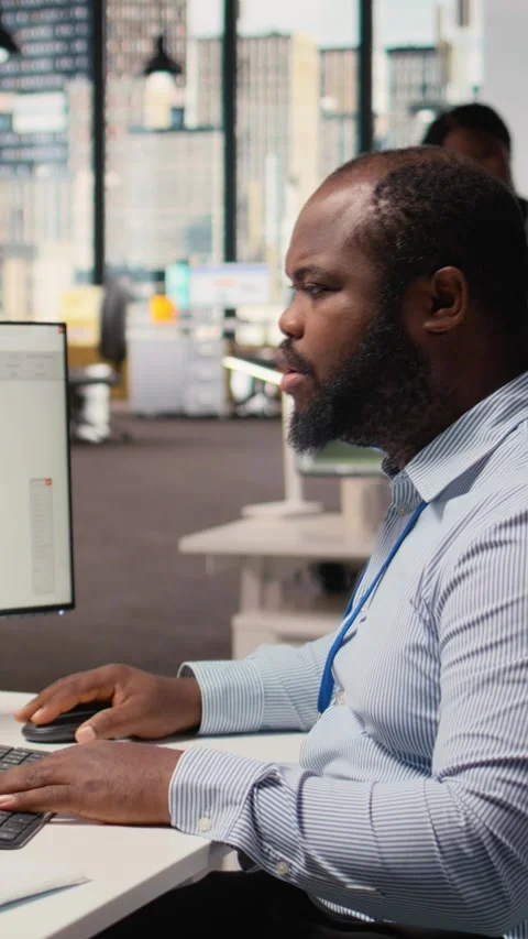 Technician using CAD program on PC to optimize wind turbine design Stock Footage 315417313