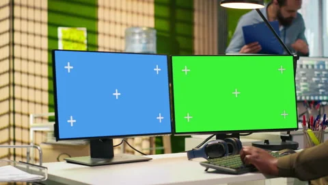 Technician using green screen PC to code AI algorithms debugging software Stock Footage 313164701