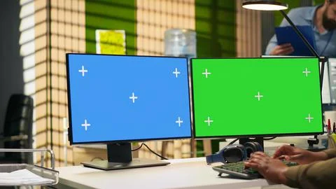 Technician using green screen PC to code AI algorithms debugging software Foto stock