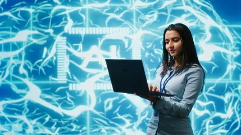 Technician using laptop to maintenance artificial intelligence neural networks 스톡 사진