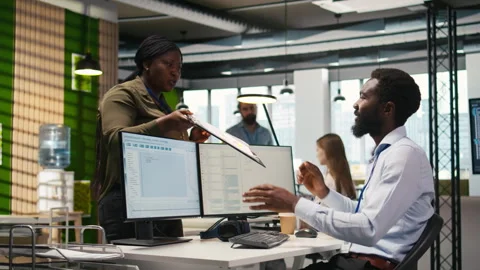 Technician using PC to code, testing applications to minimize bugs Stock Footage 313016997