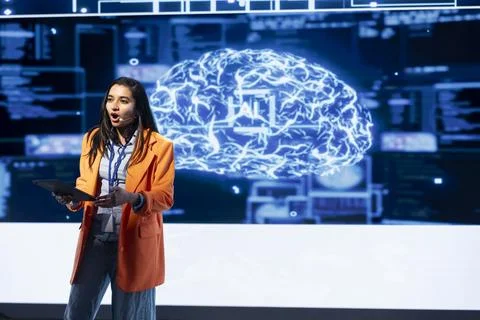 Technician using tablet during AI tech presentation Stockfoto's