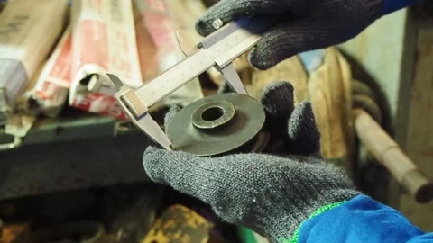 The technician using Vernier checked the tool 1 Stock Footage 135515726