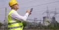 Technician Verifying Electrical High Voltage Wires Parameters Energy Industry 4k or 4k+ Resolution