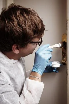 Technician at work on fingerprint Stock Photos
