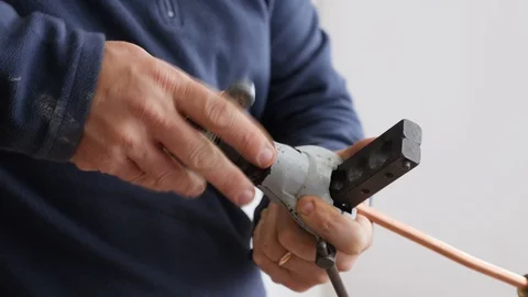 Technician at work- reparing air conditioner Stock Footage 85593629