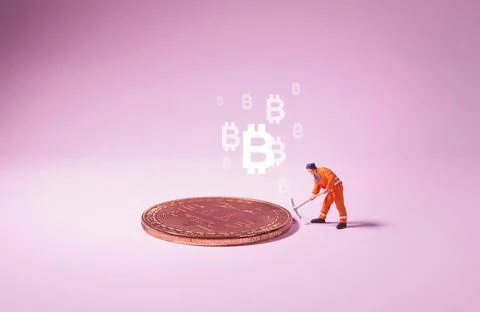 Technician worker figure standing in front of bitcoin. Bitcoin mining concept Stock Photos