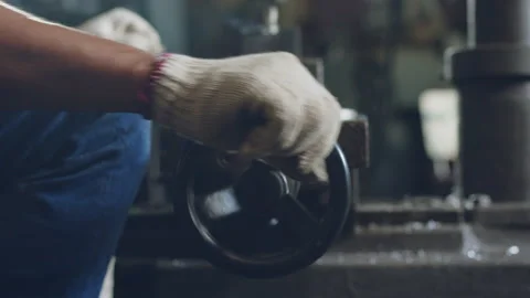 Technician worker using drilling machine for metalworking in workshop factory Stock Footage 204054838