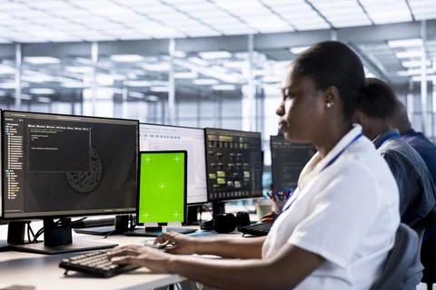 Technician working on chroma key device to prevent data center damages Stock Photos