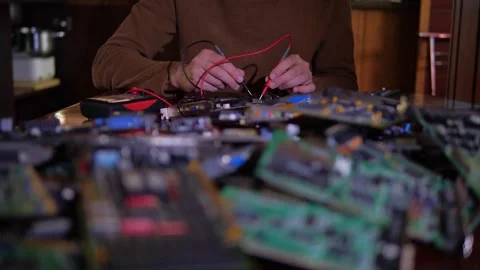 Technician Working on Circuit Boards, Foreground Focus Video stock 311393975