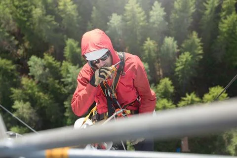 Technician Working at Height on a 5g Telecom Tower 写真素材