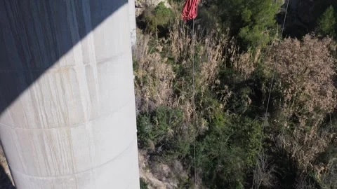 Technician working at height on bridge inspection Stock Footage 306669554