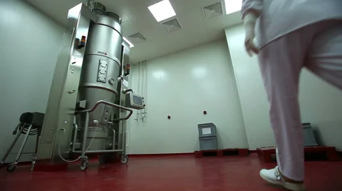 Technician working with a pill making machine Stock Footage 36631643