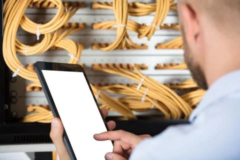 Technician Working On Server In The Data Center Stock Photos