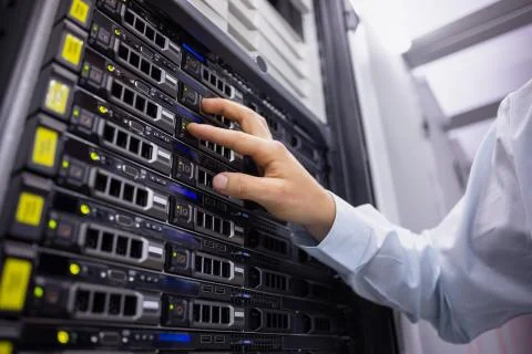 Technician working on server tower Stock Photos
