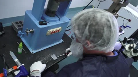 Technician working with tools in cleanroom Stock Footage 10895439