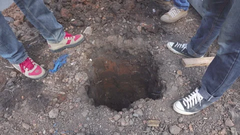 Technicians are digging holes to install high-voltage power poles Stock Footage 248163259