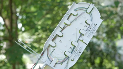 Technicians are installing optic fiber with cable ties. Stock Footage 89680682