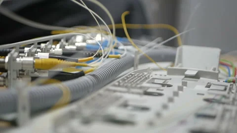 Technicians are installing optic fiber with cable ties. Stock Footage 97659165