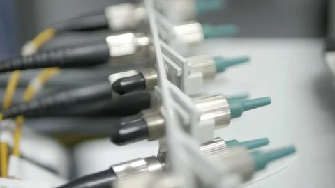 Technicians are installing optic fiber with cable ties. Stock Footage 97695159