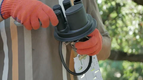 Technicians are installing optic fiber with cable ties. Stock Footage 112240491