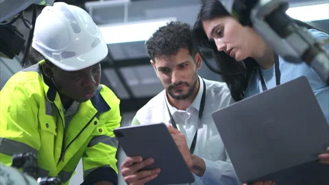 Technicians are introducing industrial hand robots Stock Footage 266694445