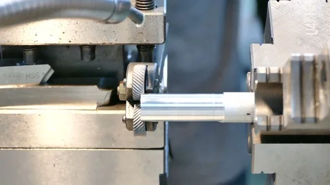 Technicians are turning lathe with horizontal lathe machine Stock Footage 77481376