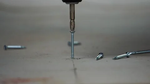 Technicians are using screw screwdriver drills to install fiber cement sheets Stock Footage 138753012