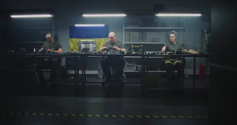 Technicians Assembling Units While Essential Materials Transported By Uniformed Stock Footage 322097270