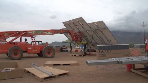 Technicians constructing solar array at White Sands Missile Range - 2012 Stock Footage 106231657