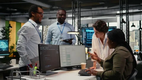 Technicians doing brainstorming in office, using AI specialized hardware Stock Footage 323033664