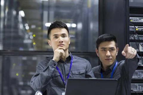  Technicians doing maintenance in computer room Beijing China Copyright: x... Foto stock