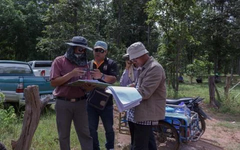 Technicians is find satellite coordinates for boundary line between the distr Stock Photos