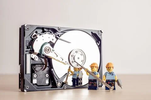 Technicians fixing HDD drive Stock Photos