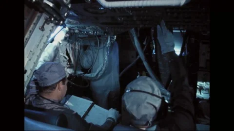 Technicians inside CM 104 during systems test - 1968 Stock Footage 104330933